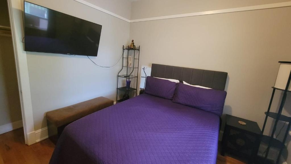 En eller flere senge i et værelse på Afrique Francaise de Woodlawn 2