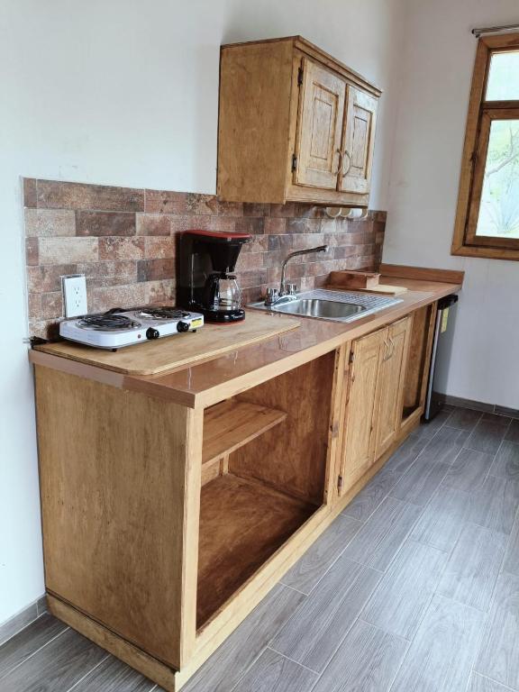 Kuchyň nebo kuchyňský kout v ubytování Cabañas Los Olivos