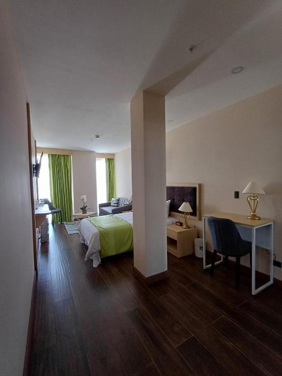 Postel nebo postele na pokoji v ubytování Hotel Puerto Limón CR