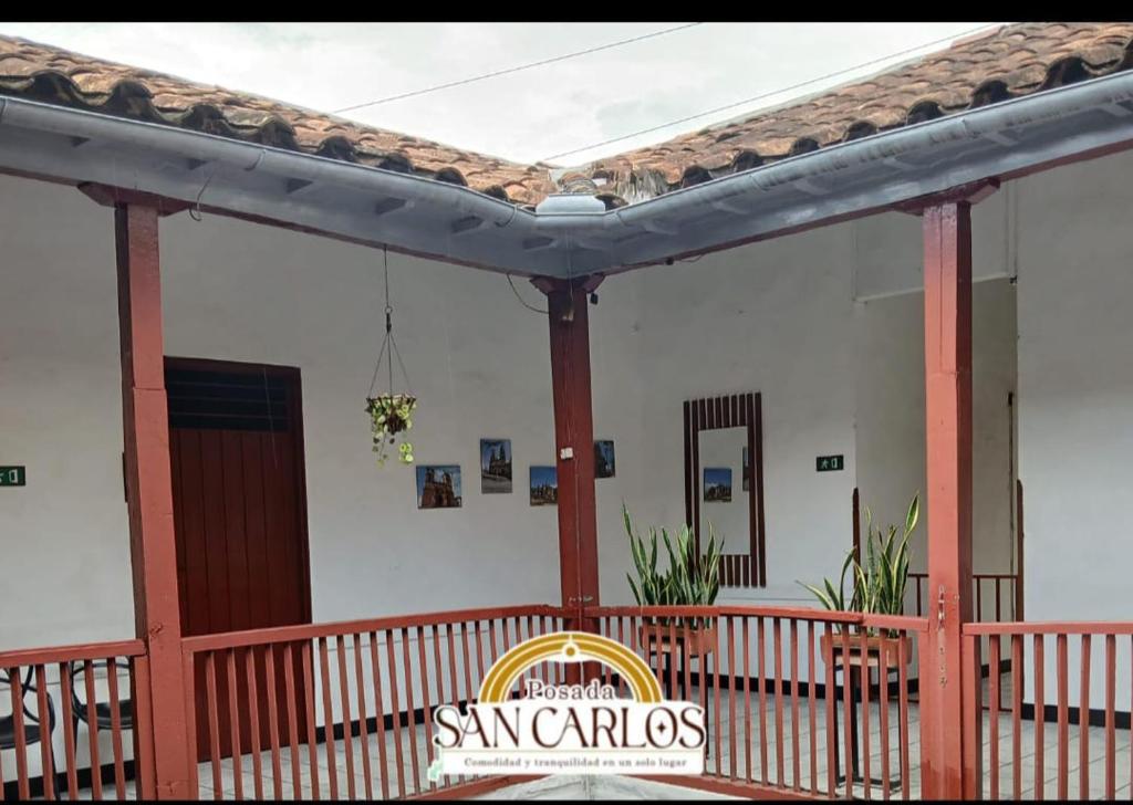 Certificat, premi, rètol o un altre document de Posada San Carlos