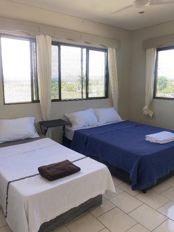 Postel nebo postele na pokoji v ubytování ideal airport rooms