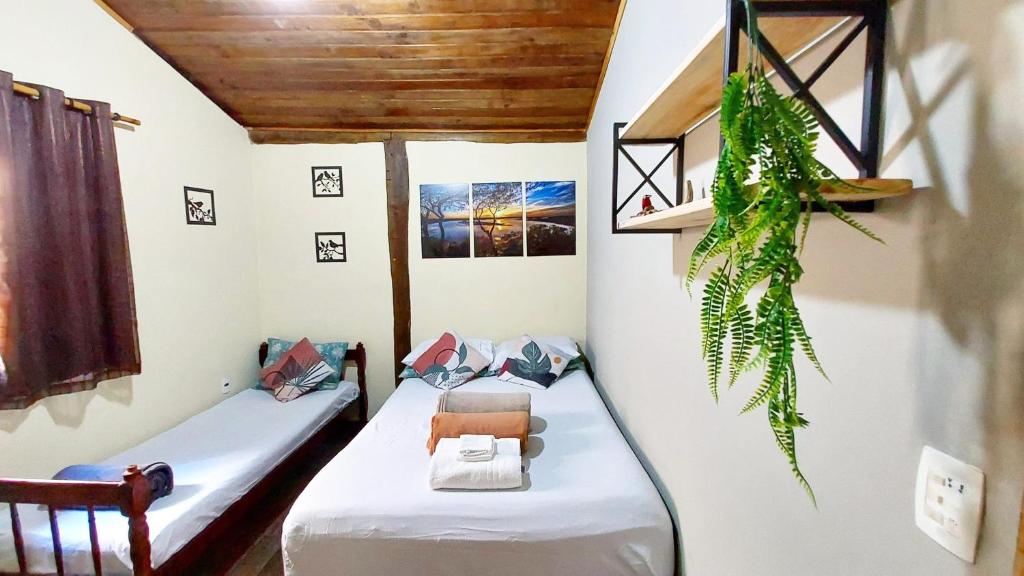 Postel nebo postele na pokoji v ubytování Pousada Pé na Montanha