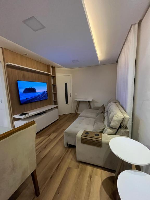 Et opholdsområde på Apto aconchegante e lindo