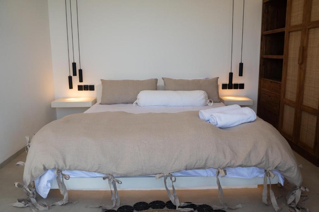 Postel nebo postele na pokoji v ubytování Yemaya Villas