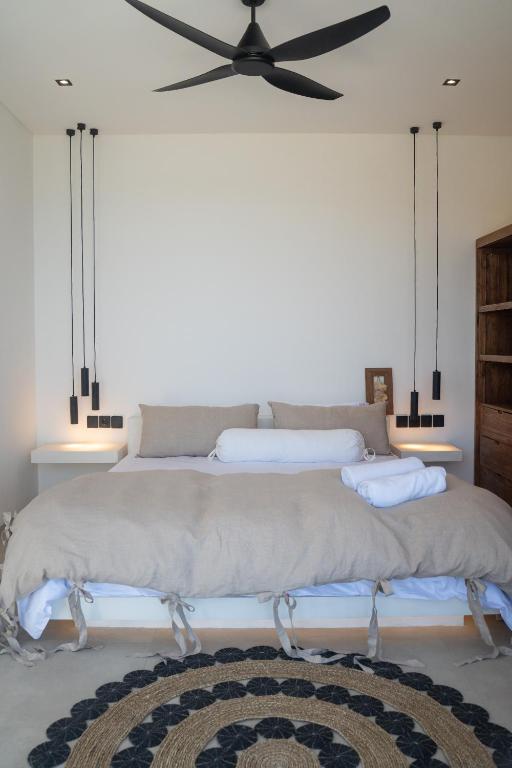 Postel nebo postele na pokoji v ubytování Yemaya Villas