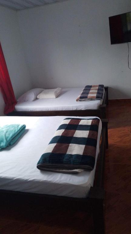 Postel nebo postele na pokoji v ubytování hospedage murillo