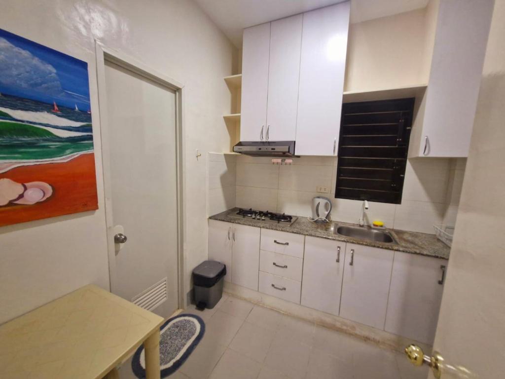 Kuchyň nebo kuchyňský kout v ubytování CAP Apartments