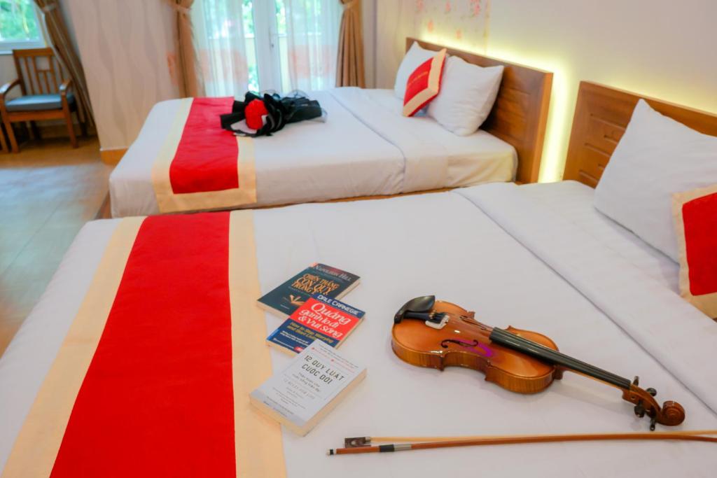 Postel nebo postele na pokoji v ubytování Seika Hotel by The Moment