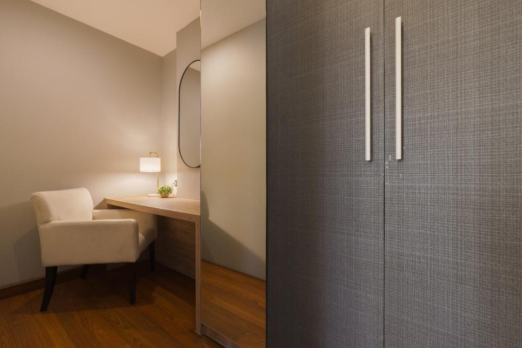 Postel nebo postele na pokoji v ubytování iCheck inn Residence soi 2