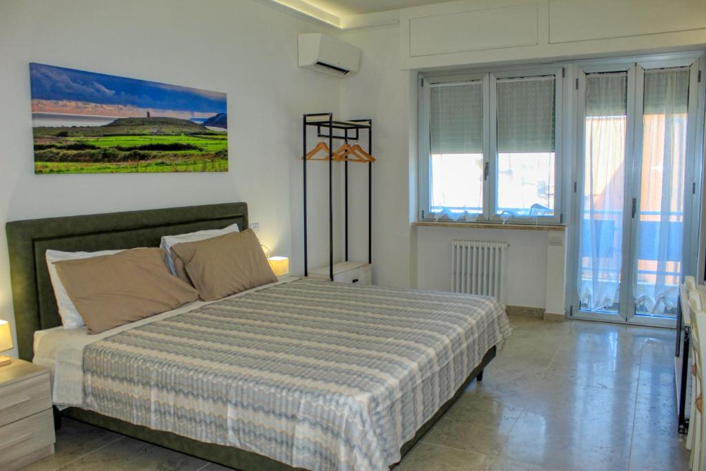 Postel nebo postele na pokoji v ubytování Mesalia Casa Vacanze