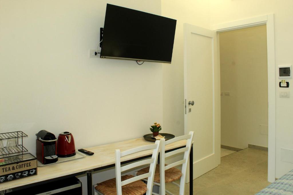 TV a/nebo společenská místnost v ubytování Mesalia Casa Vacanze