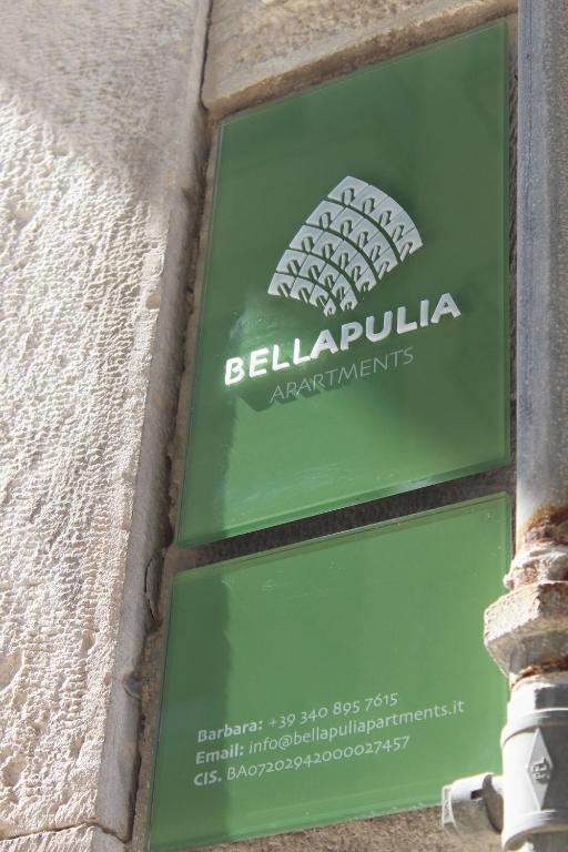 a sign on the side of a building at Bellapulia apartments in Molfetta