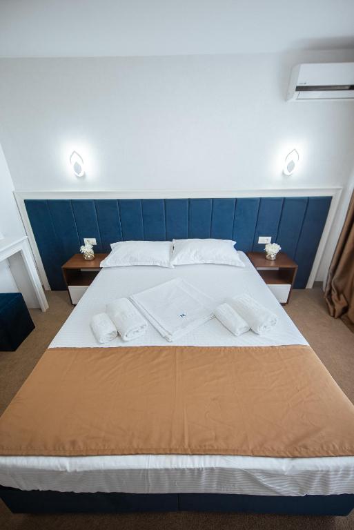Postel nebo postele na pokoji v ubytování Hotel Meteor