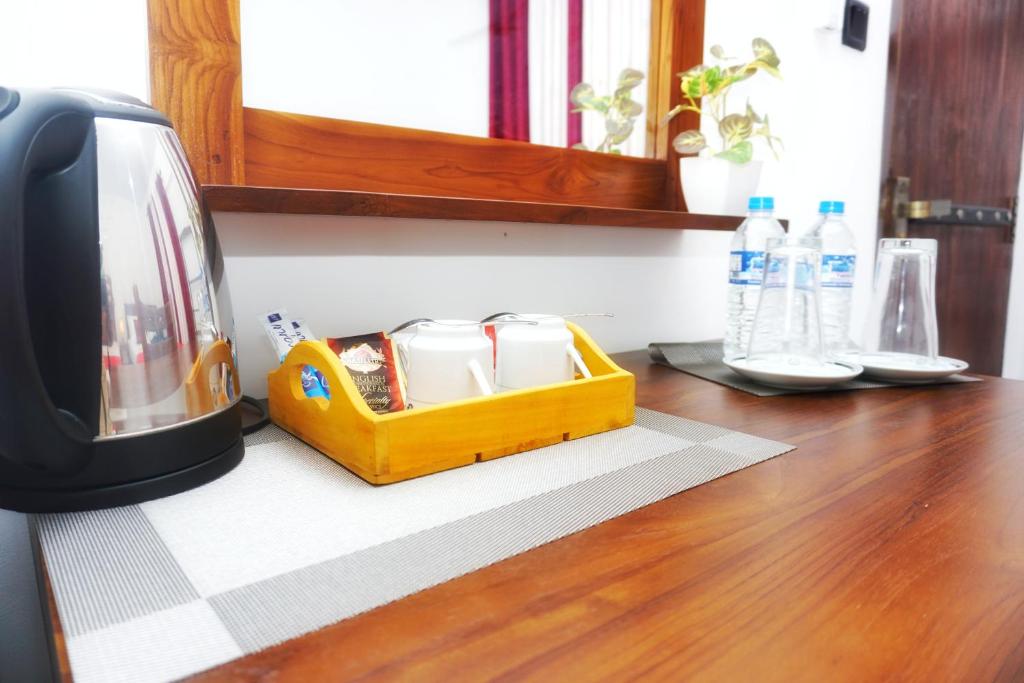 Postel nebo postele na pokoji v ubytování Sashini Homestay
