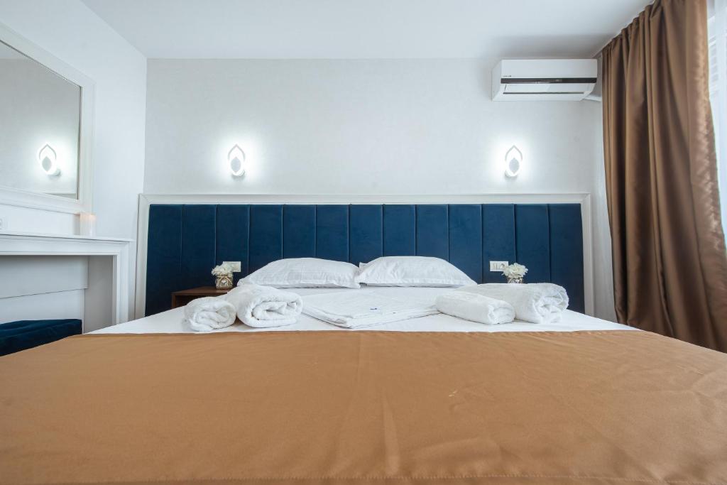 Postel nebo postele na pokoji v ubytování Hotel Meteor
