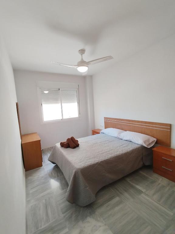 Posteľ alebo postele v izbe v ubytovaní Apartamentos Séneca junto al Centro