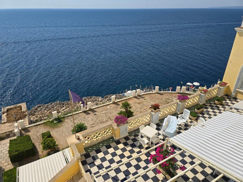 an aerial view of the ocean from a building at Miramare palazzo Tamborino in Santa Cesarea Terme