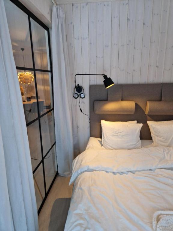 Postel nebo postele na pokoji v ubytování Lindvallen Ski In Söderåstorget