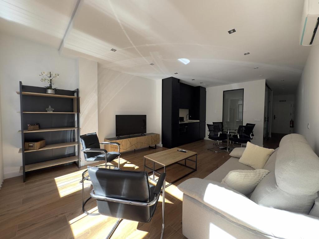 Et opholdsområde på Apartamentos ALFISA Puerta del Sol