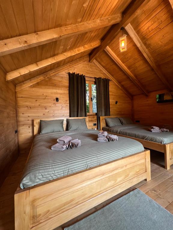Ένα ή περισσότερα κρεβάτια σε δωμάτιο στο Cottages Serdar