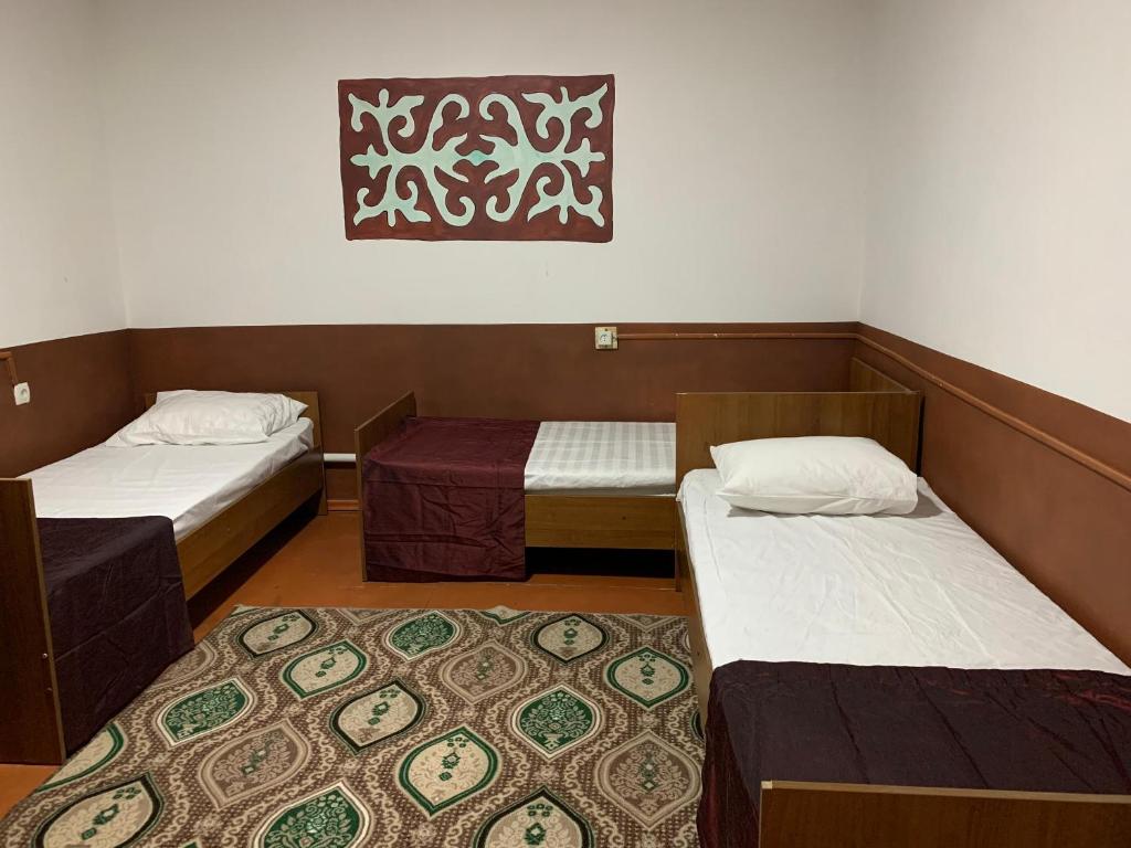 Postel nebo postele na pokoji v ubytování Bozui Hostel