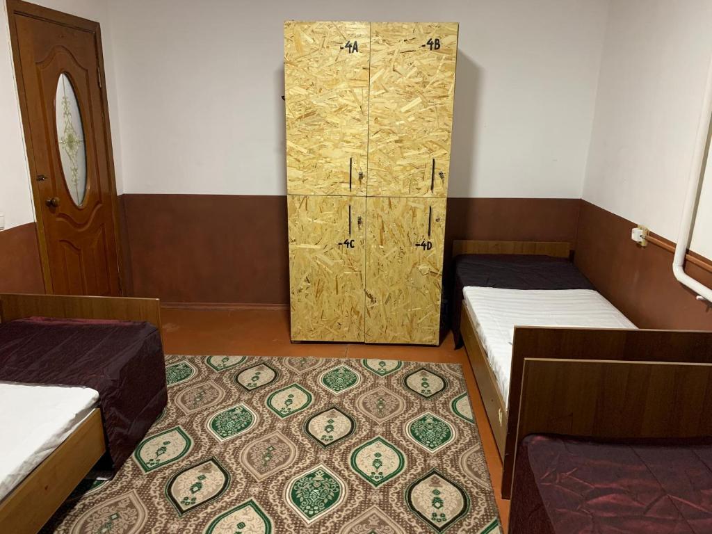 Postel nebo postele na pokoji v ubytování Bozui Hostel