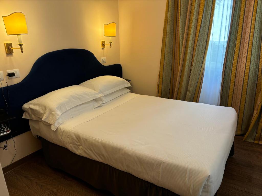 Postel nebo postele na pokoji v ubytování Boutique Hotel Heritage