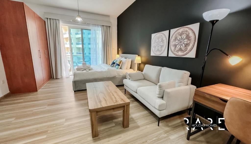 Rare Holiday Homes - Pool View - Crescent Tower - Dubai Production City ...