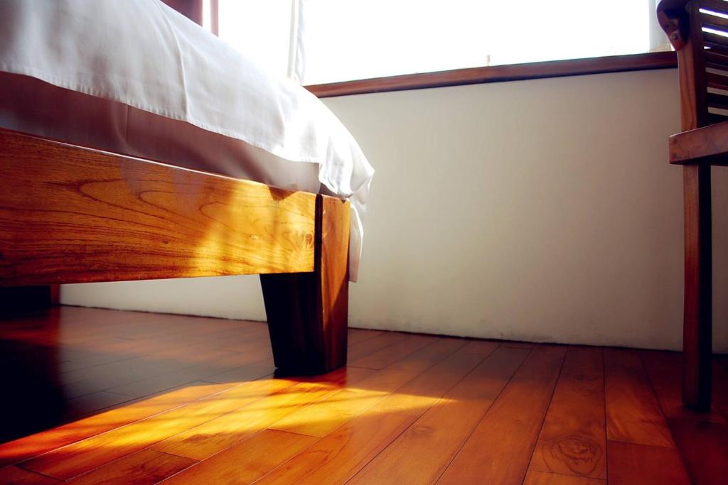 Postel nebo postele na pokoji v ubytování Yentai Hotel