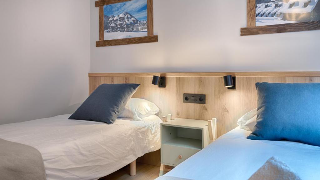 Postel nebo postele na pokoji v ubytování Casa Tino