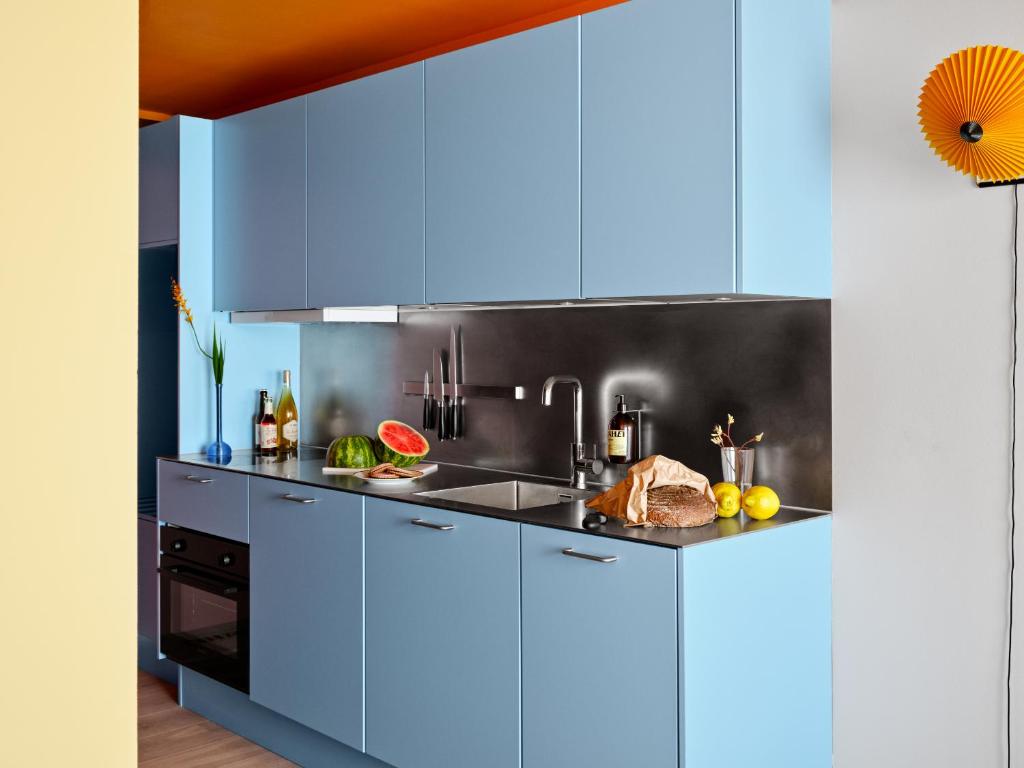 Kuchyň nebo kuchyňský kout v ubytování Dahei Apartment Hotel
