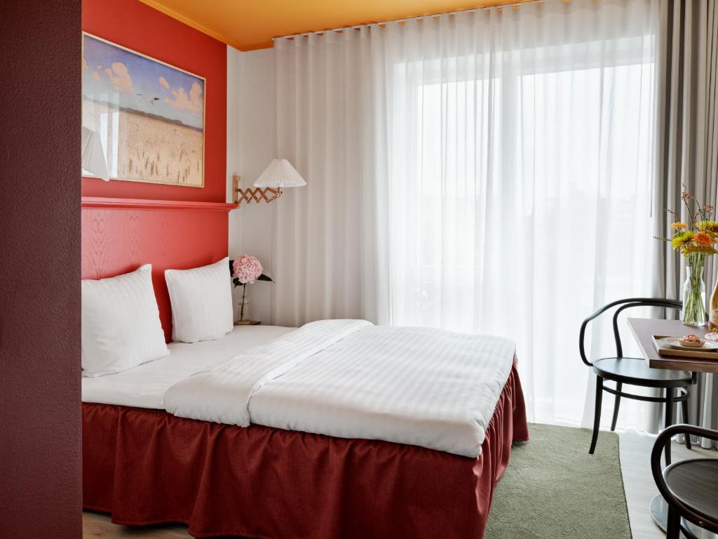 Postel nebo postele na pokoji v ubytování Dahei Apartment Hotel