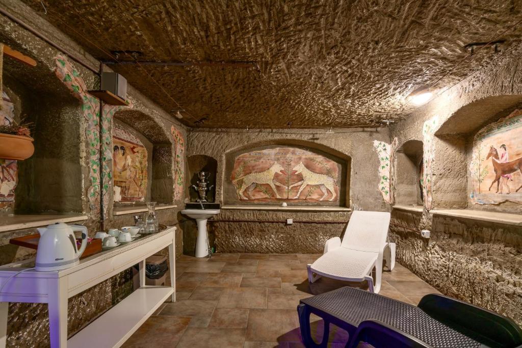 Posezení v ubytování ISA - Residence with swimming pool in Sorano, apartments with air conditioning and private outdoor area