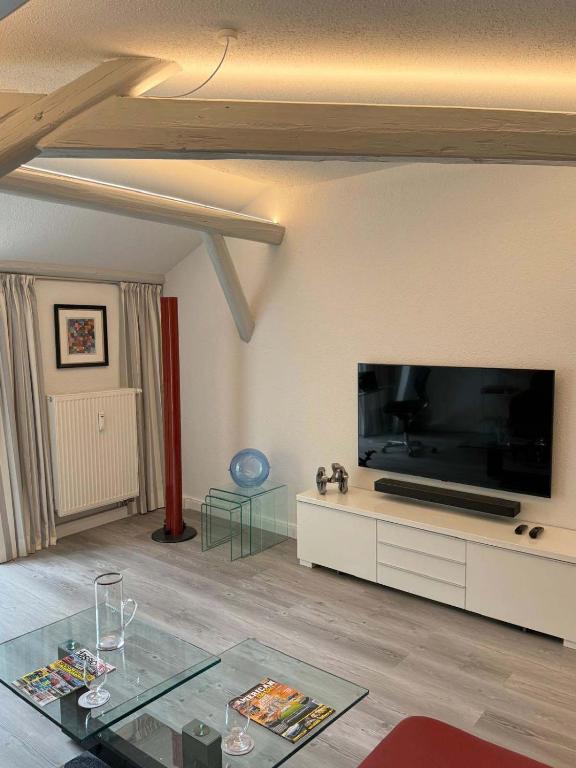 TV a/nebo společenská místnost v ubytování Brauhaus Suite 16