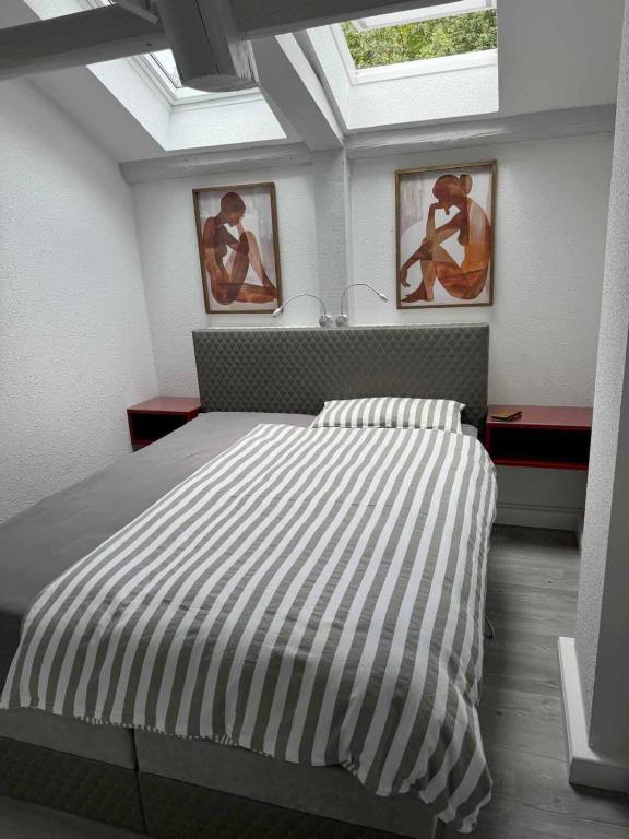 Postel nebo postele na pokoji v ubytování Brauhaus Suite 16