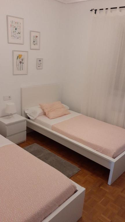 Postel nebo postele na pokoji v ubytování Apartamento El Coso