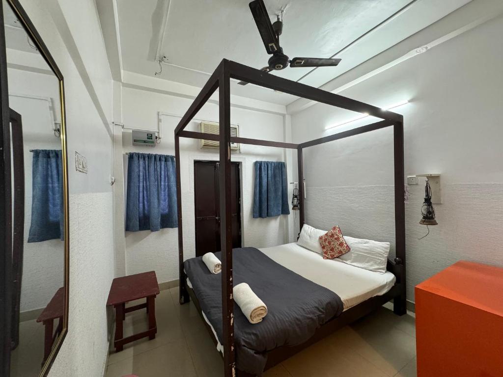 Letto o letti in una camera di Madsquad Hostel Dorms & Rooms