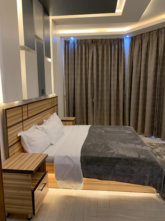 Postel nebo postele na pokoji v ubytování Serenity Houses