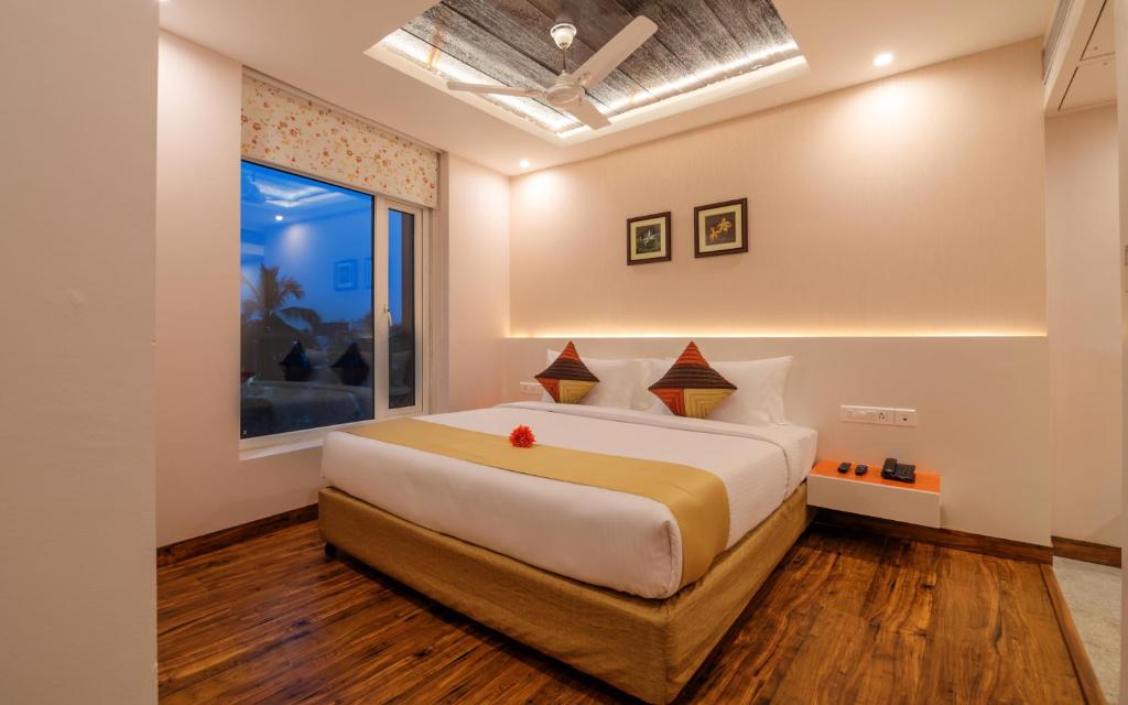 Postel nebo postele na pokoji v ubytování Mango Hotels Prangan