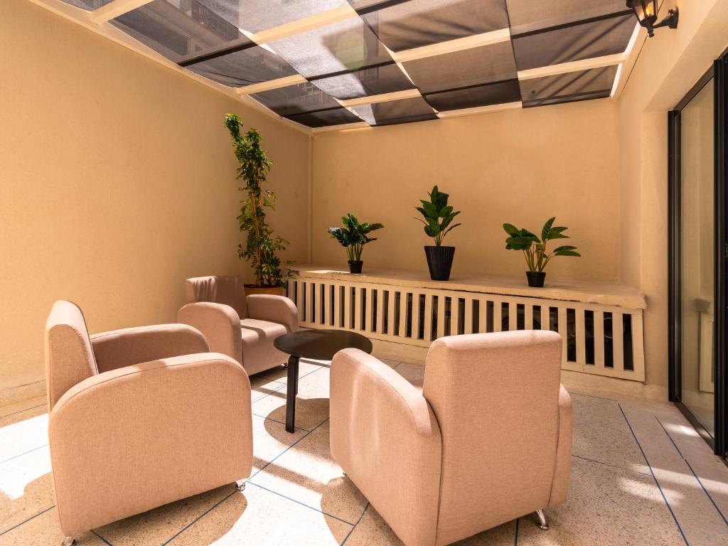 Posezení v ubytování Unico Hotel Maarif