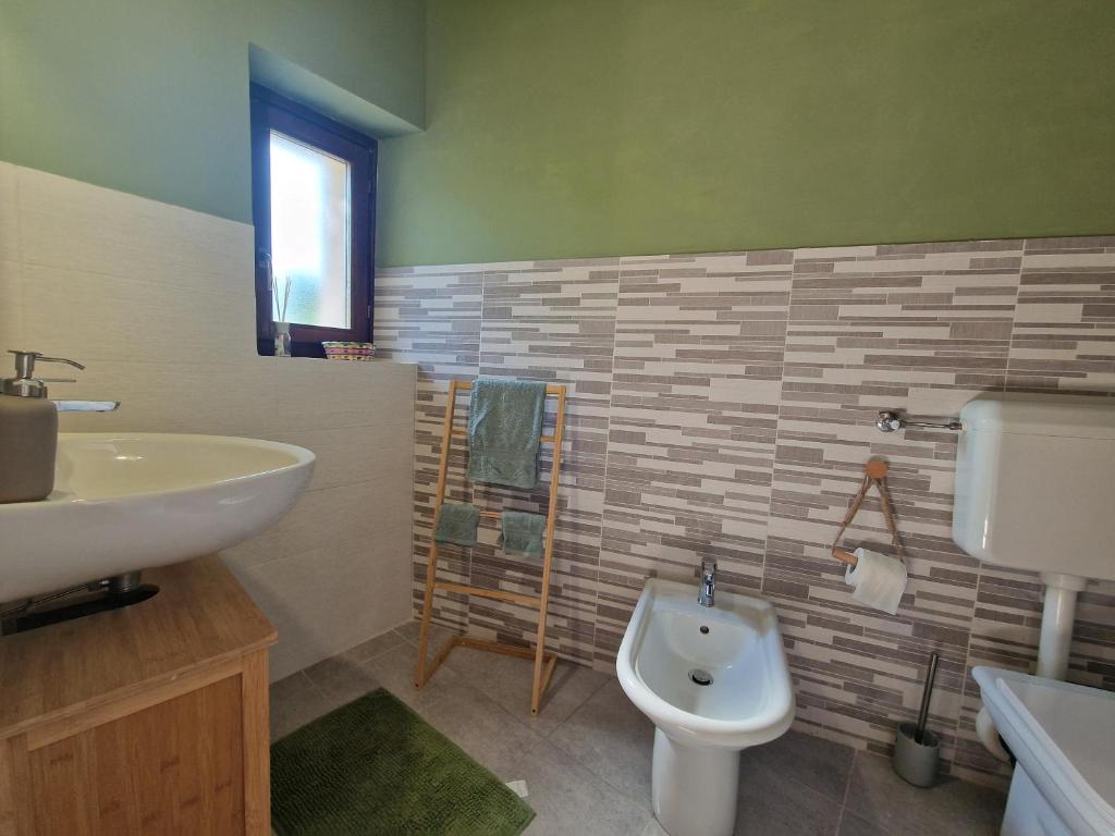 Ένα μπάνιο στο Home Sweet Olivia by TraMonti Apartments