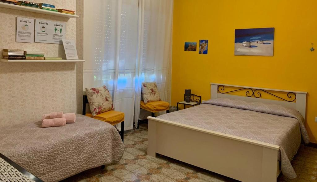 Postel nebo postele na pokoji v ubytování B & B Il Mirto 2