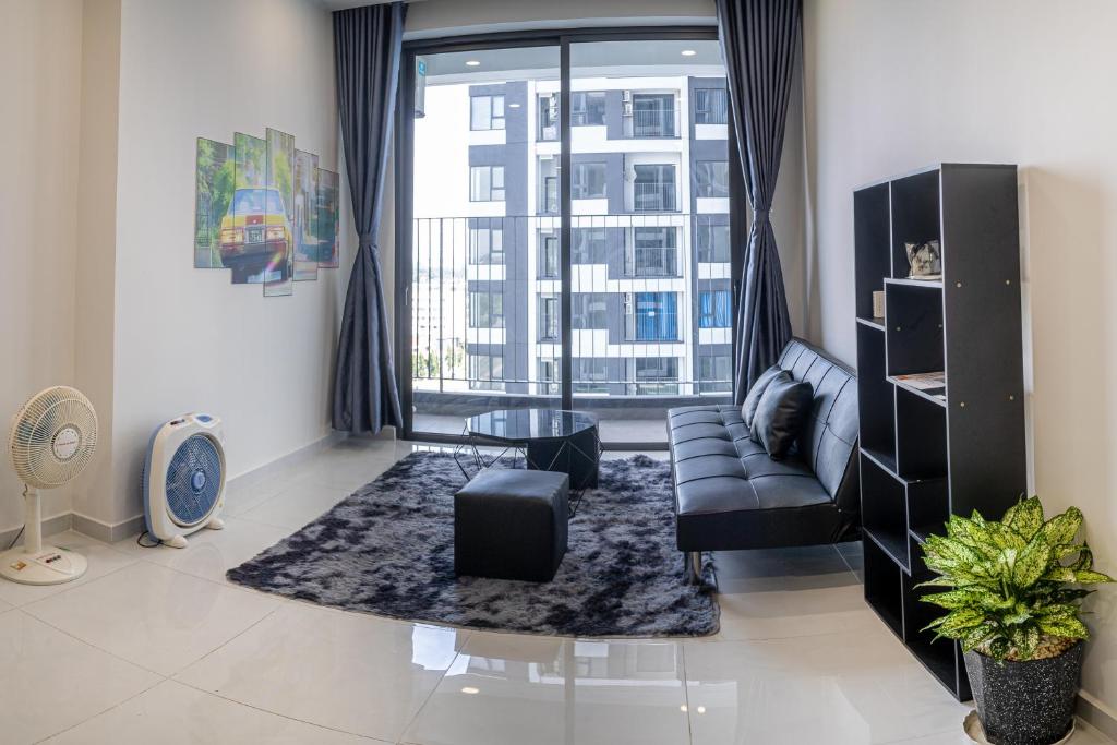 Χώρος καθιστικού στο The Emerald Golf View Apartment - Smell House by Phuoc Nguyen