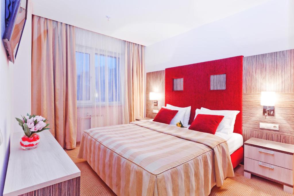 
Кровать или кровати в номере Отель East Gate
