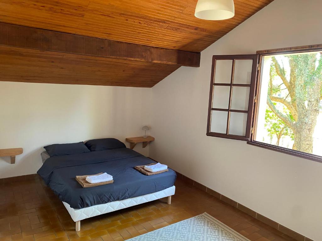 Postel nebo postele na pokoji v ubytování Maison landaise au cœur de Moliets