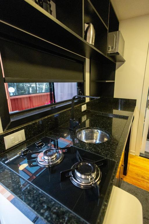 Kuchyň nebo kuchyňský kout v ubytování Cabanas Loft Paraíso