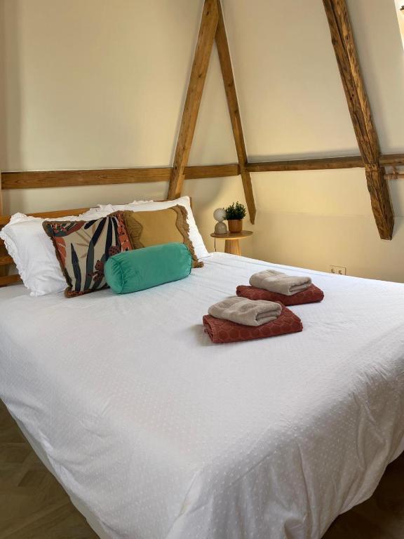 Postel nebo postele na pokoji v ubytování B&B Suupmarkt