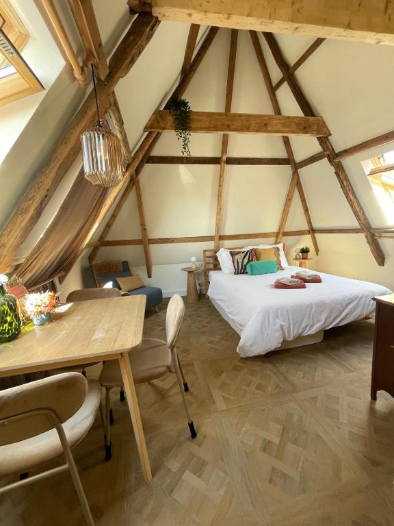 Postel nebo postele na pokoji v ubytování B&B Suupmarkt
