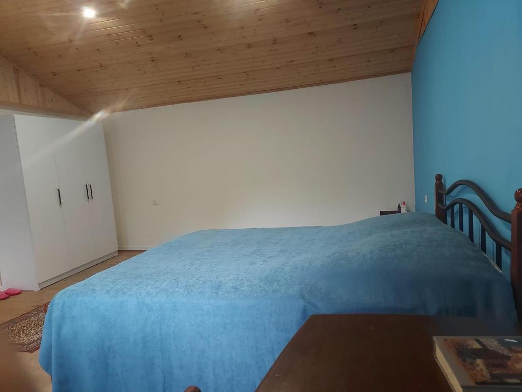 Llit o llits en una habitació de Cozy Qorte