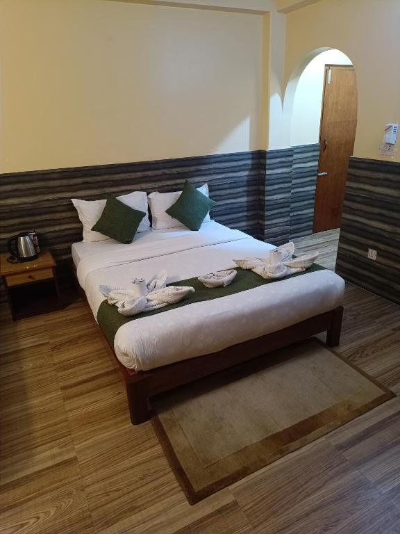 Letto o letti in una camera di The Mountain House